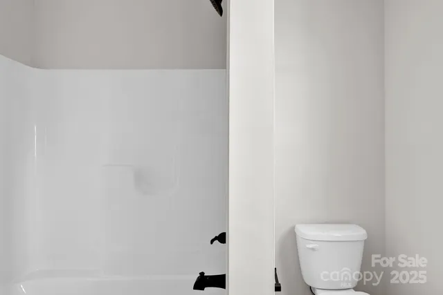 a bathroom with a toilet