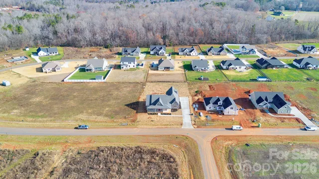a view of swimming pool with outdoor seating
