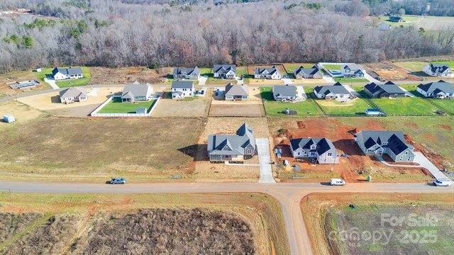 a view of swimming pool with outdoor seating