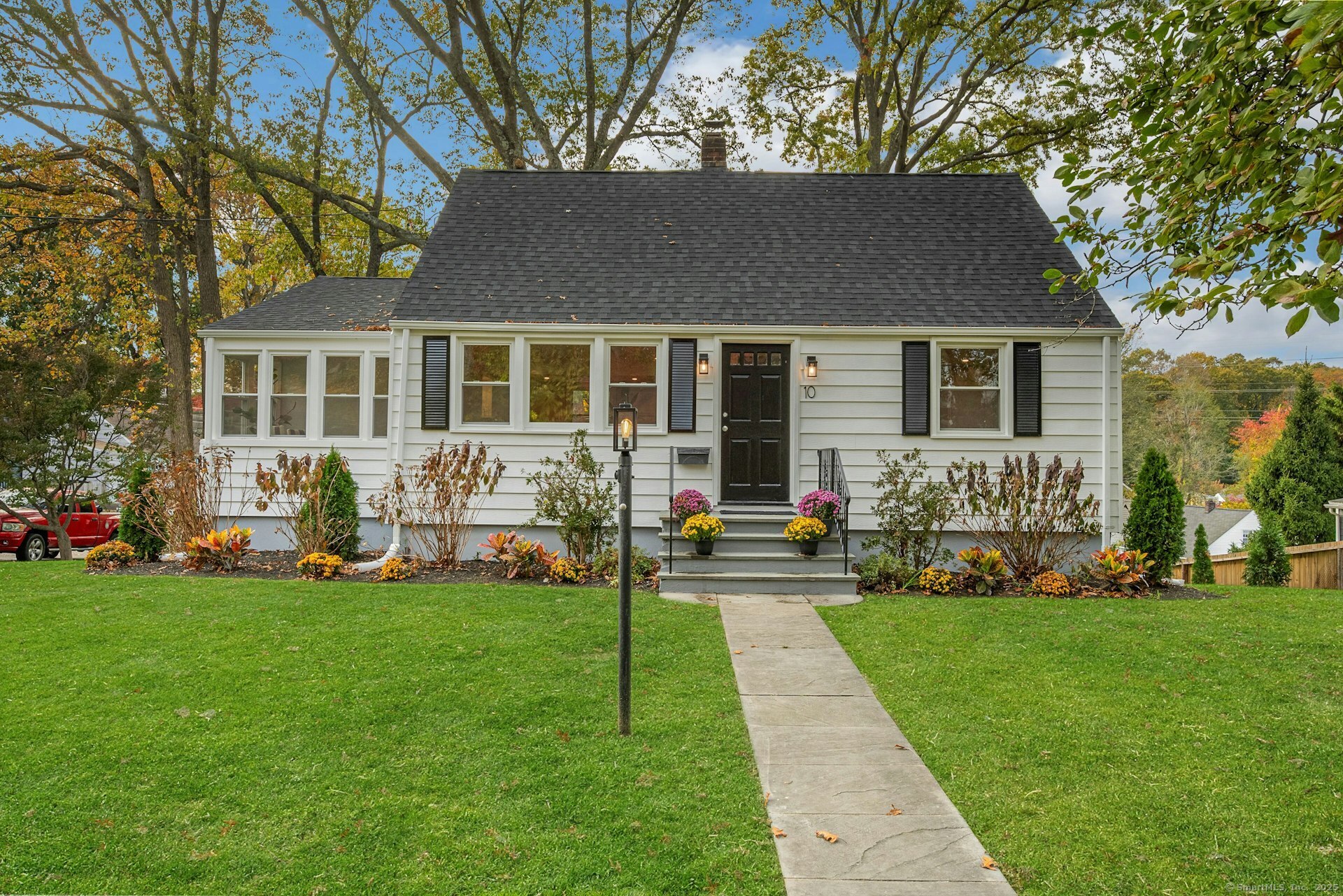 10 Parallel Street Norwalk, CT 06850 - Photo 1 of 1 a view of a house with a yard and sitting area