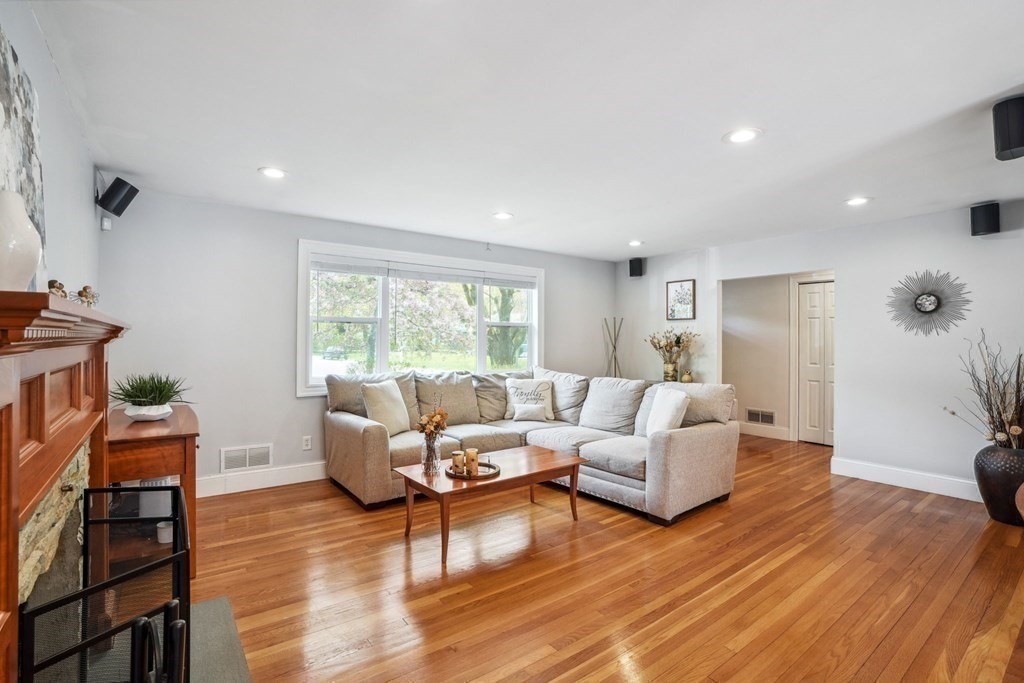 32 Red Barn Road Wayland, MA 01778 - Photo 6 of 27 a living room with furniture and a wooden floor