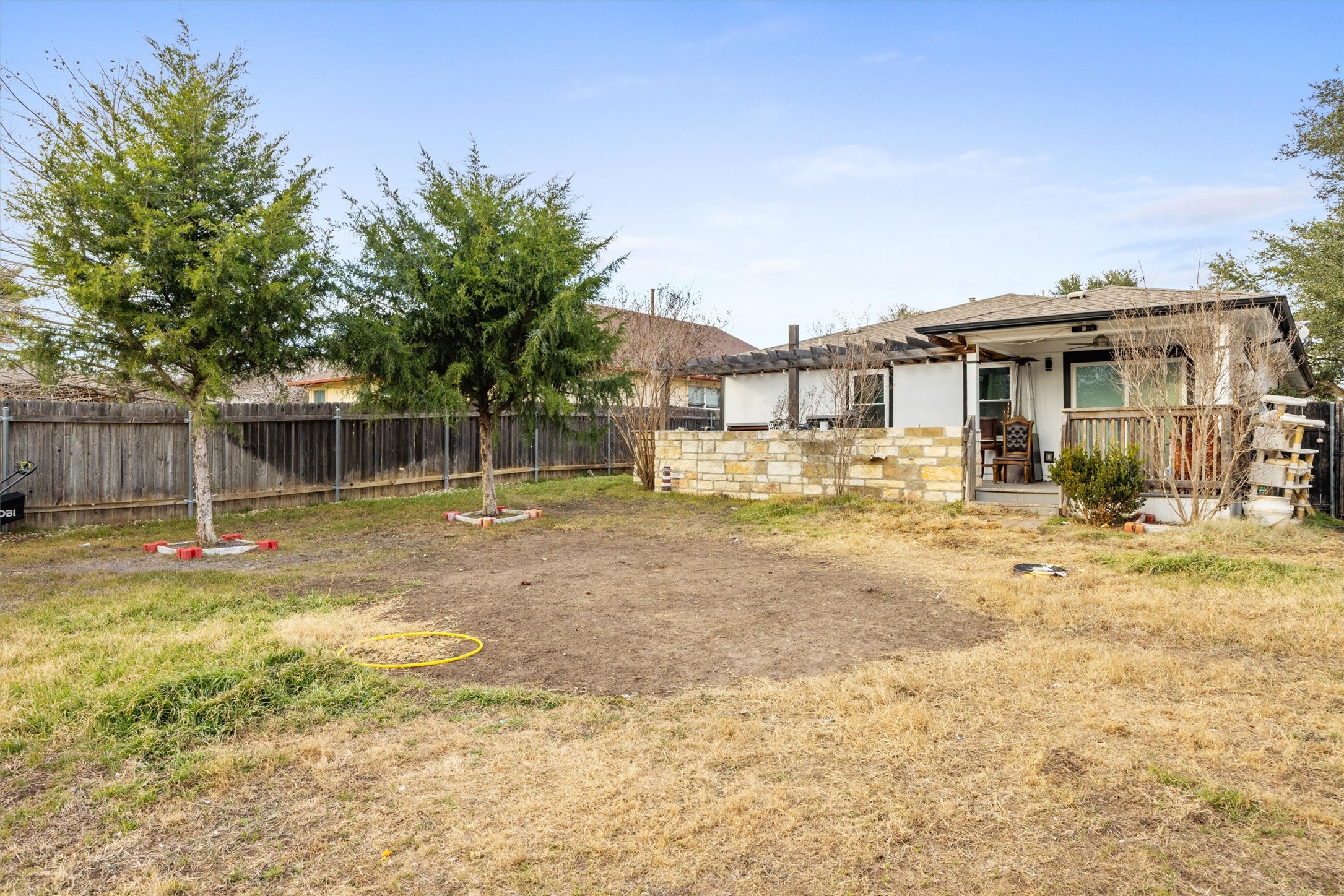 14409 Sandifer Street Austin, TX 78725 - Photo 26 of 31 Fenced backyard featuring a patio area