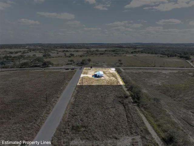 a house view with a backyard space