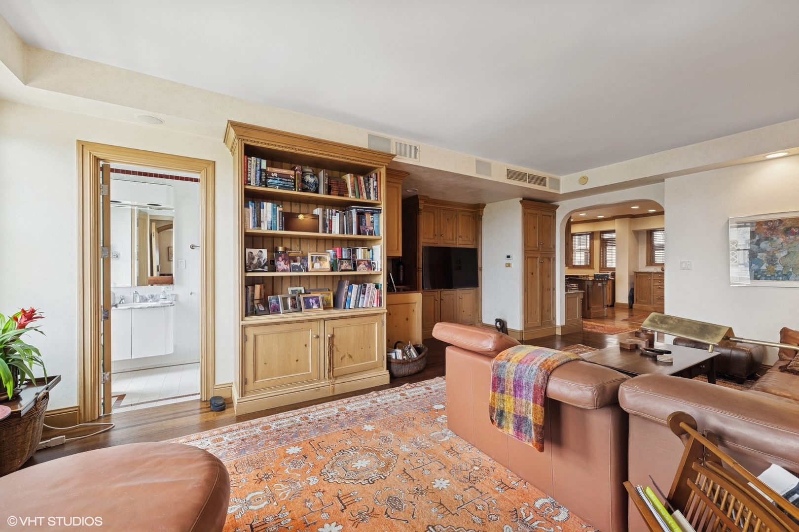 3500 North Lake Shore Drive, Unit 7C Chicago, IL 60657 - Photo 11 of 36 a bedroom with furniture and a book shelf