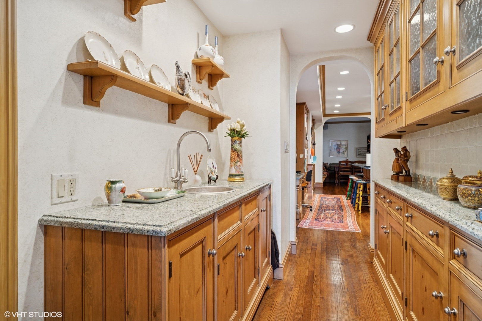 3500 North Lake Shore Drive, Unit 7C Chicago, IL 60657 - Photo 17 of 36 a kitchen with a sink a stove and cabinets