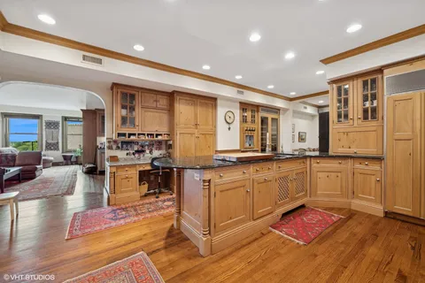 a kitchen with granite countertop lots of counter top space and stainless steel appliances