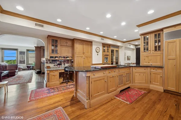 a kitchen with granite countertop lots of counter top space and stainless steel appliances