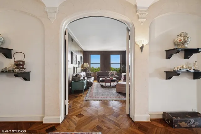 a living room with furniture fireplace and a flat screen tv