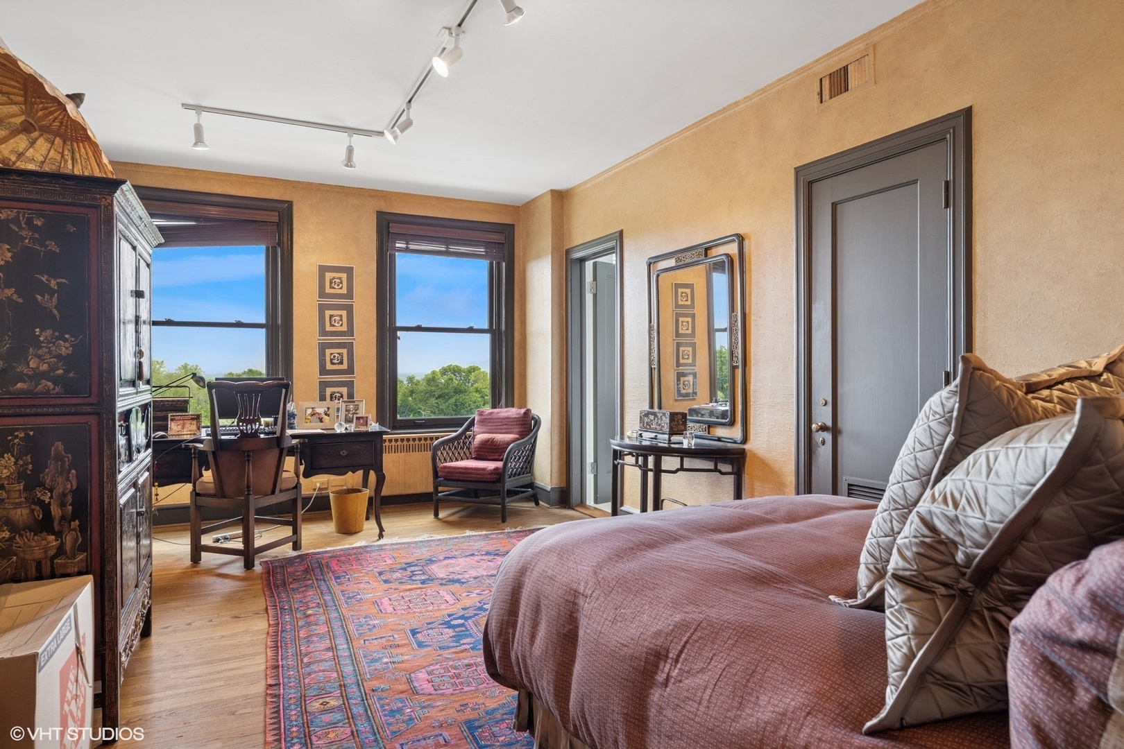 3500 North Lake Shore Drive, Unit 7C Chicago, IL 60657 - Photo 26 of 36 a spacious bedroom with a bed and a large window