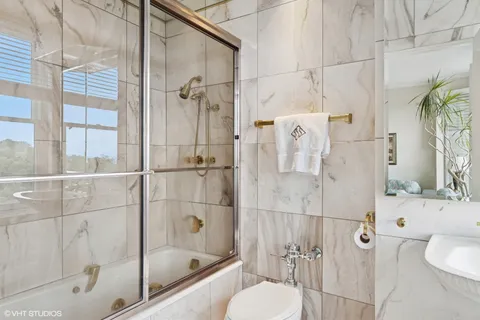 a bathroom with a sink and a bathtub