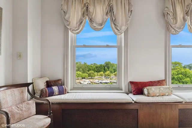 a room with a bed and window