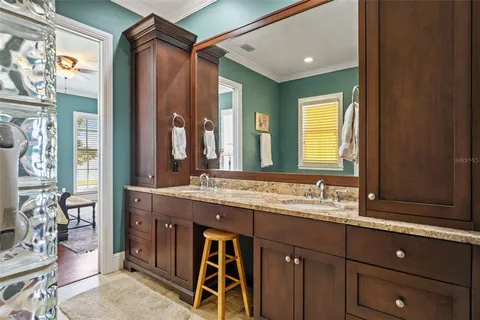 a bathroom with a toilet and a mirror
