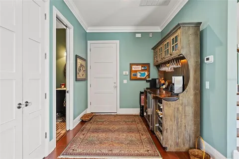 a front view of a house with a yard table and chairs