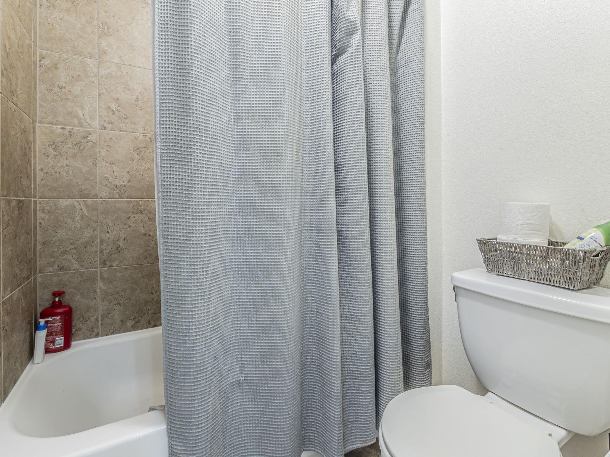 1366 Heep Run Buda, TX 78610 - Photo 23 of 37 Jack and Jill full bathroom featuring toilet and shower / bath combo
