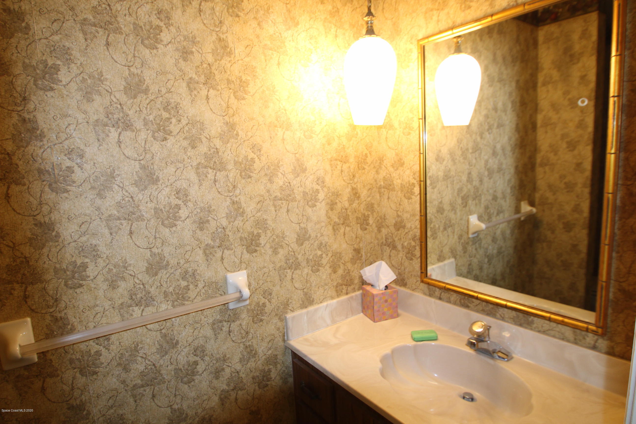 790 Montclair Road Northeast Palm Bay, FL 32905 - Photo 13 of 38 Powder Room