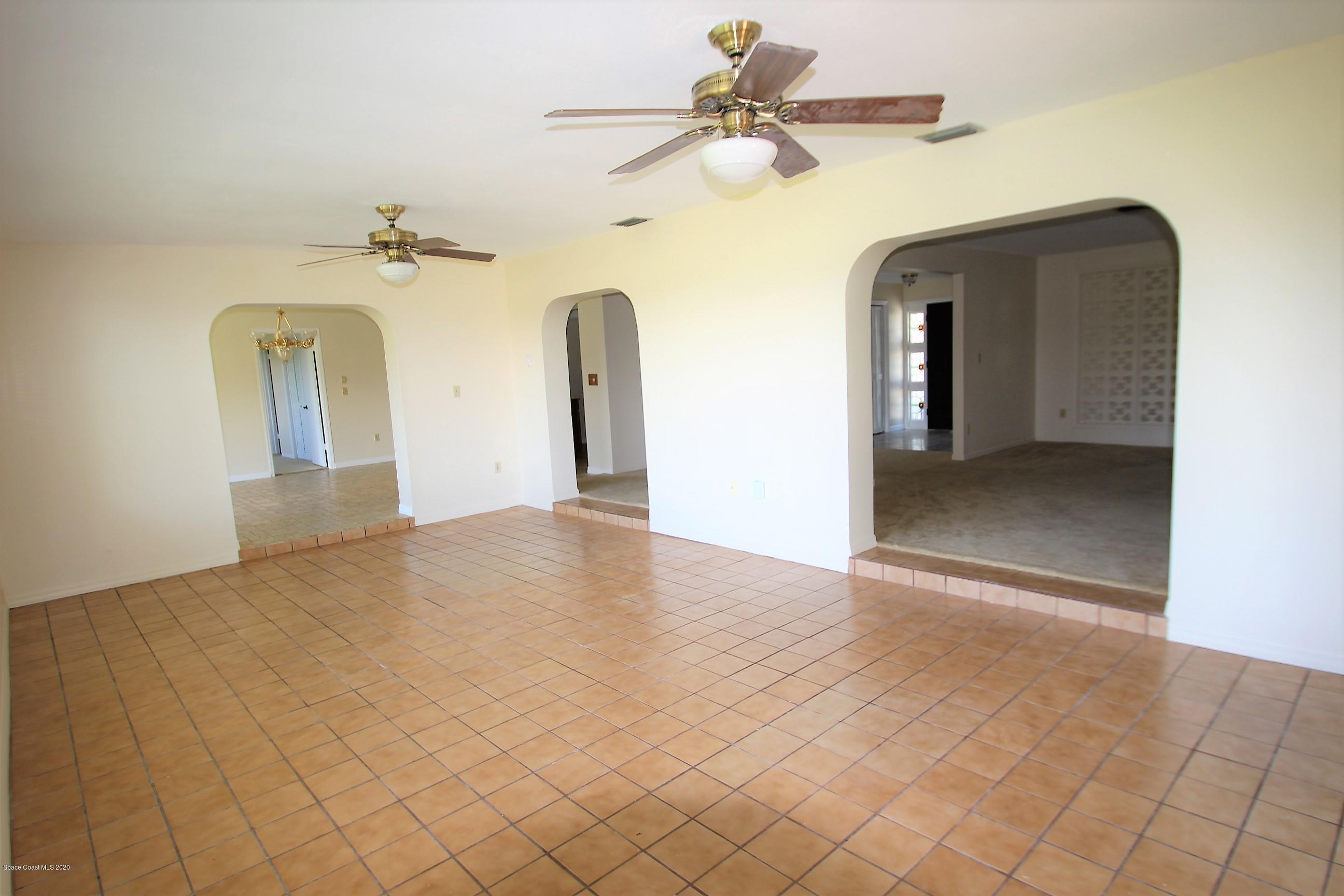 790 Montclair Road Northeast Palm Bay, FL 32905 - Photo 15 of 38 Sun Room