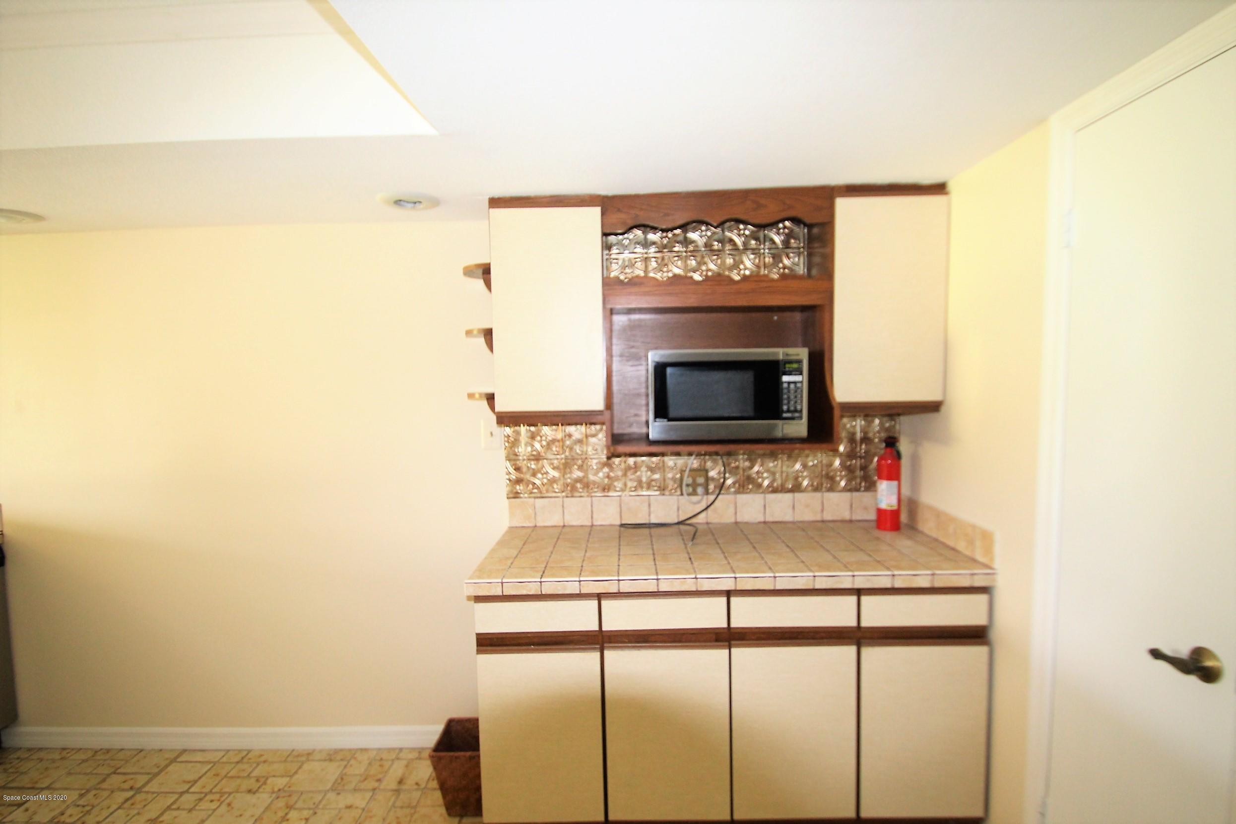 790 Montclair Road Northeast Palm Bay, FL 32905 - Photo 21 of 38 Kitchen Work Staition