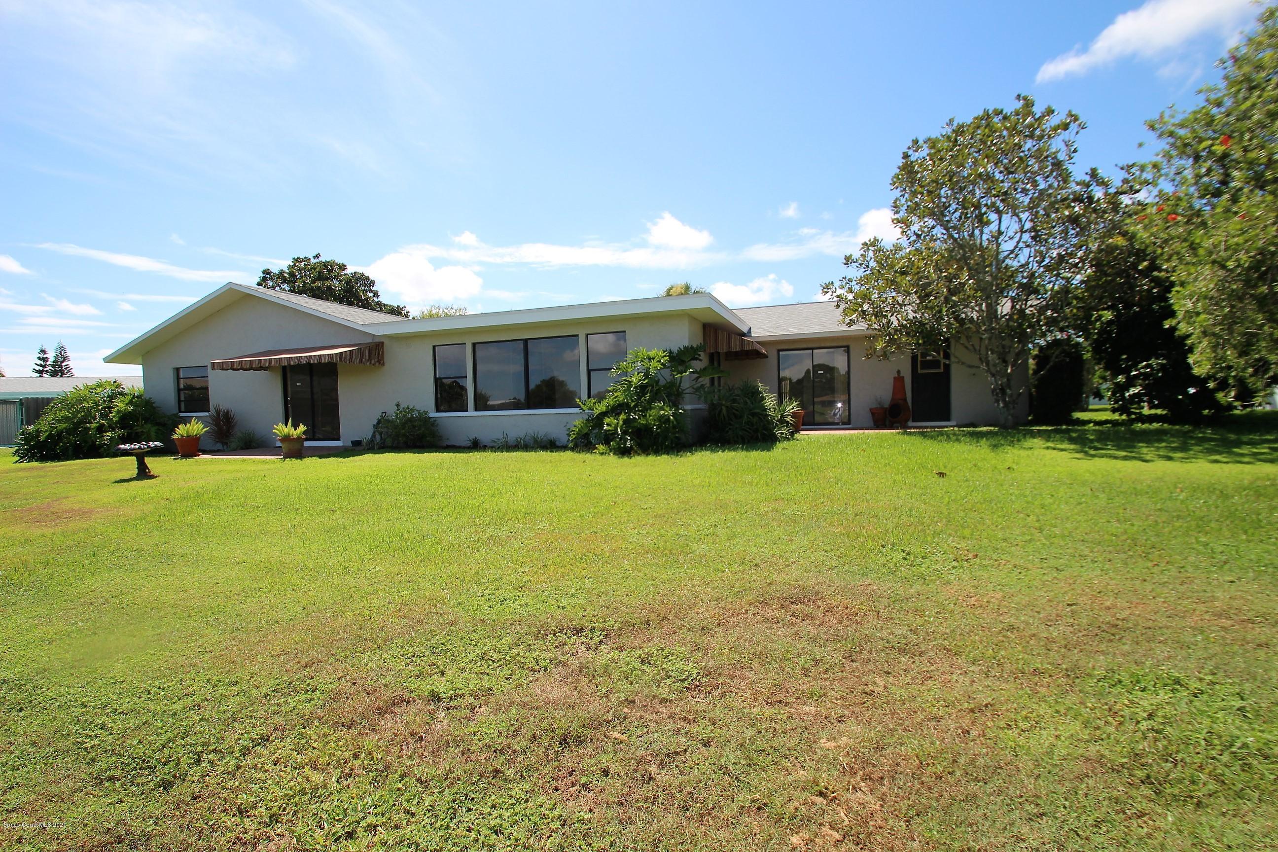 790 Montclair Road Northeast Palm Bay, FL 32905 - Photo 4 of 38 Back of Property