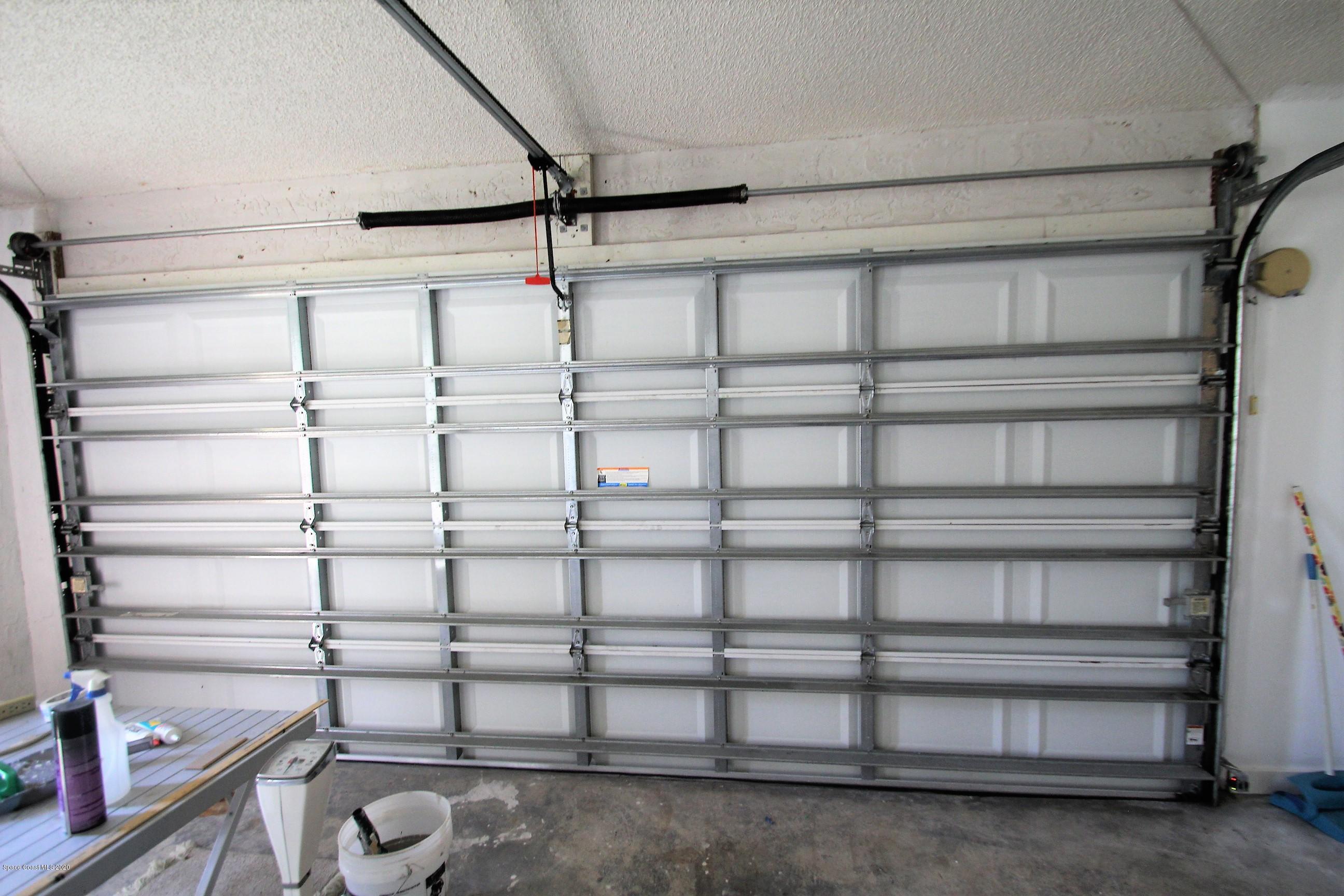 790 Montclair Road Northeast Palm Bay, FL 32905 - Photo 36 of 38 Hurricane Garage Door
