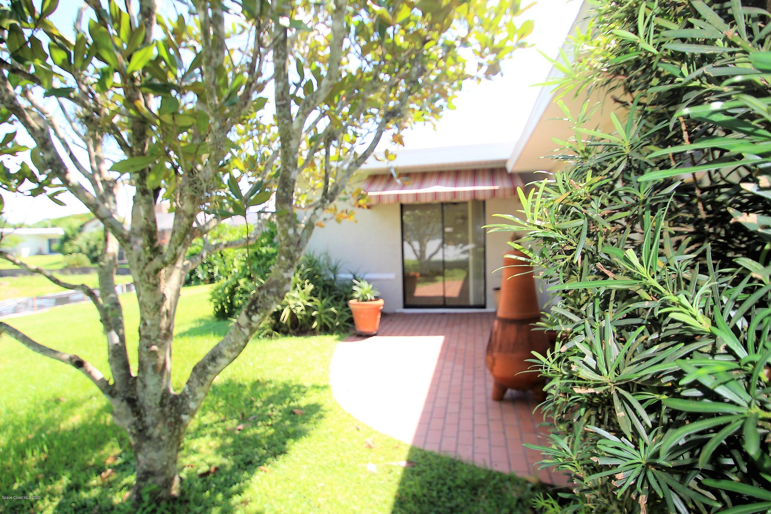 790 Montclair Road Northeast Palm Bay, FL 32905 - Photo 7 of 38 Brick Patio