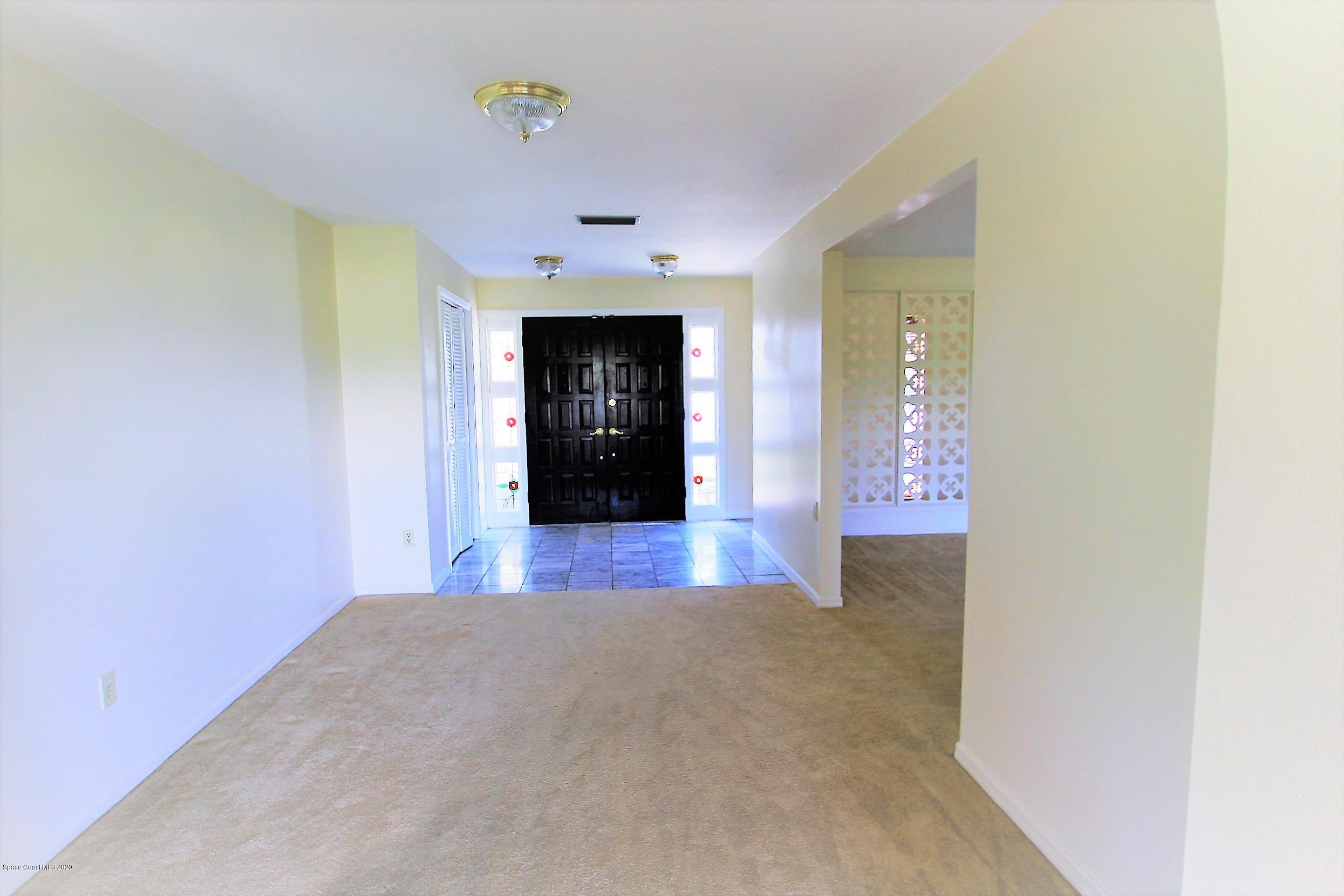 790 Montclair Road Northeast Palm Bay, FL 32905 - Photo 10 of 38 Foyer