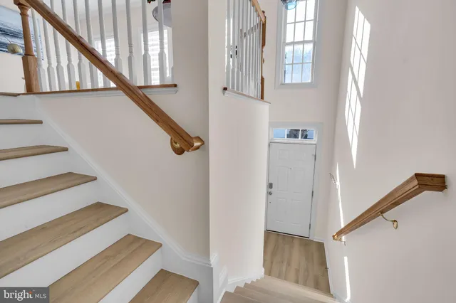 a view of a livingroom with furniture and a window