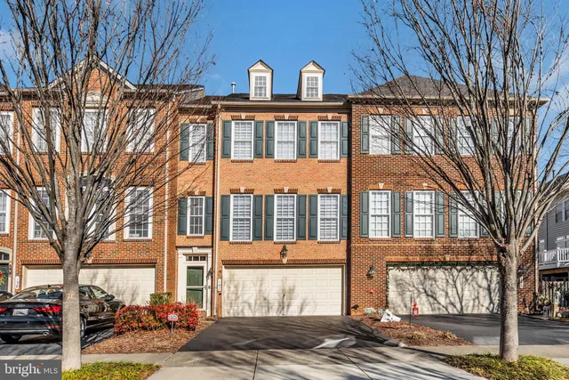 a front view of a building with a street