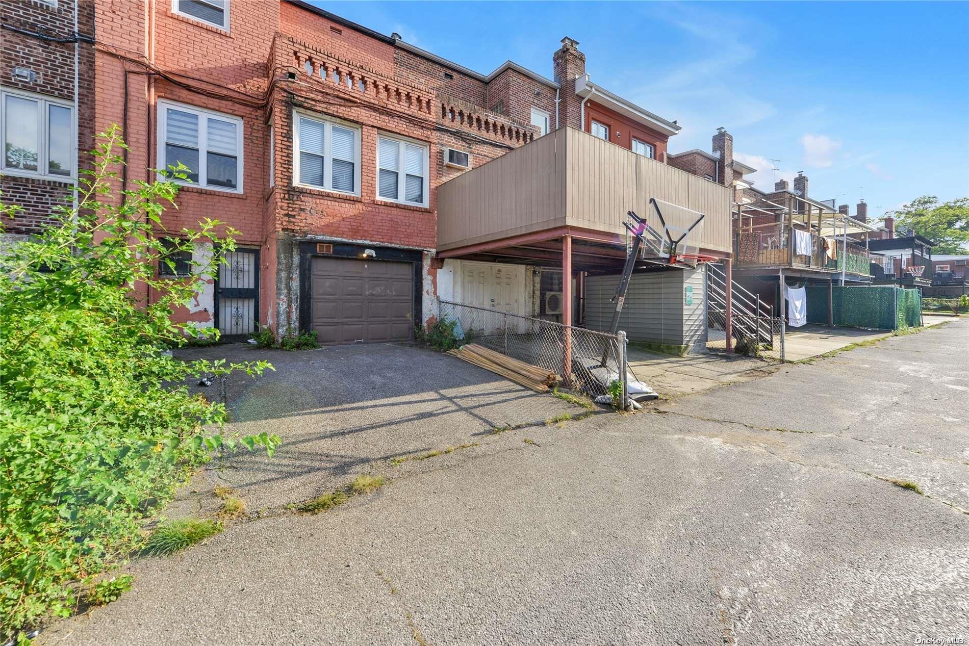 144-31 69th Road Queens, NY 11367 - Photo 20 of 21 a view of a house with a park