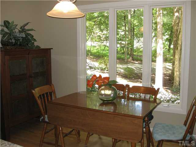 11929 Straight A Way Lane Raleigh, NC 27613 - Photo 10 of 20 Roll out windows. and hardwood floors in this eating area. Breakfast Area