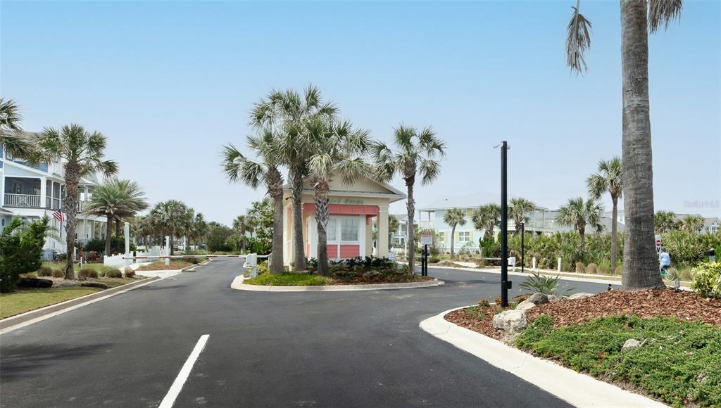 24 Sandy Beach Way Palm Coast, FL 32137 - Photo 15 of 17 a view of a street with houses
