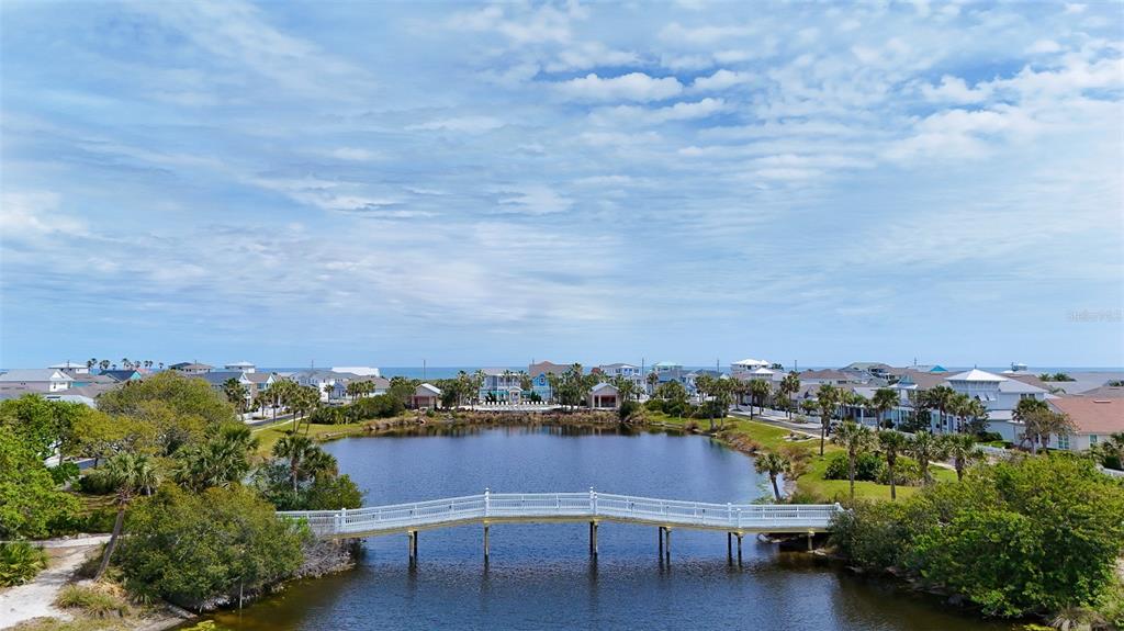 24 Sandy Beach Way Palm Coast, FL 32137 - Photo 17 of 17 a view of a city with lawn chairs