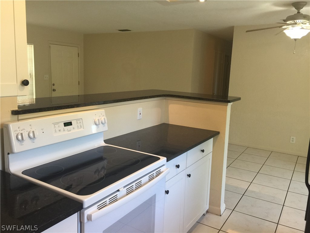 1545 Ransom Street Fort Myers, FL 33901 - Photo 11 of 25 a close view of stove