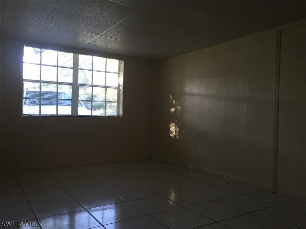 1545 Ransom Street Fort Myers, FL 33901 - Photo 18 of 25 a view of an empty room and window