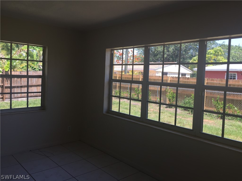 1545 Ransom Street Fort Myers, FL 33901 - Photo 20 of 25 a view of an empty room with a window