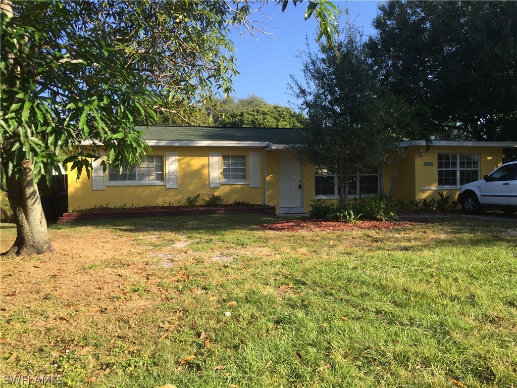 1545 Ransom Street Fort Myers, FL 33901 - Photo 25 of 25 a view of a house with backyard and garden