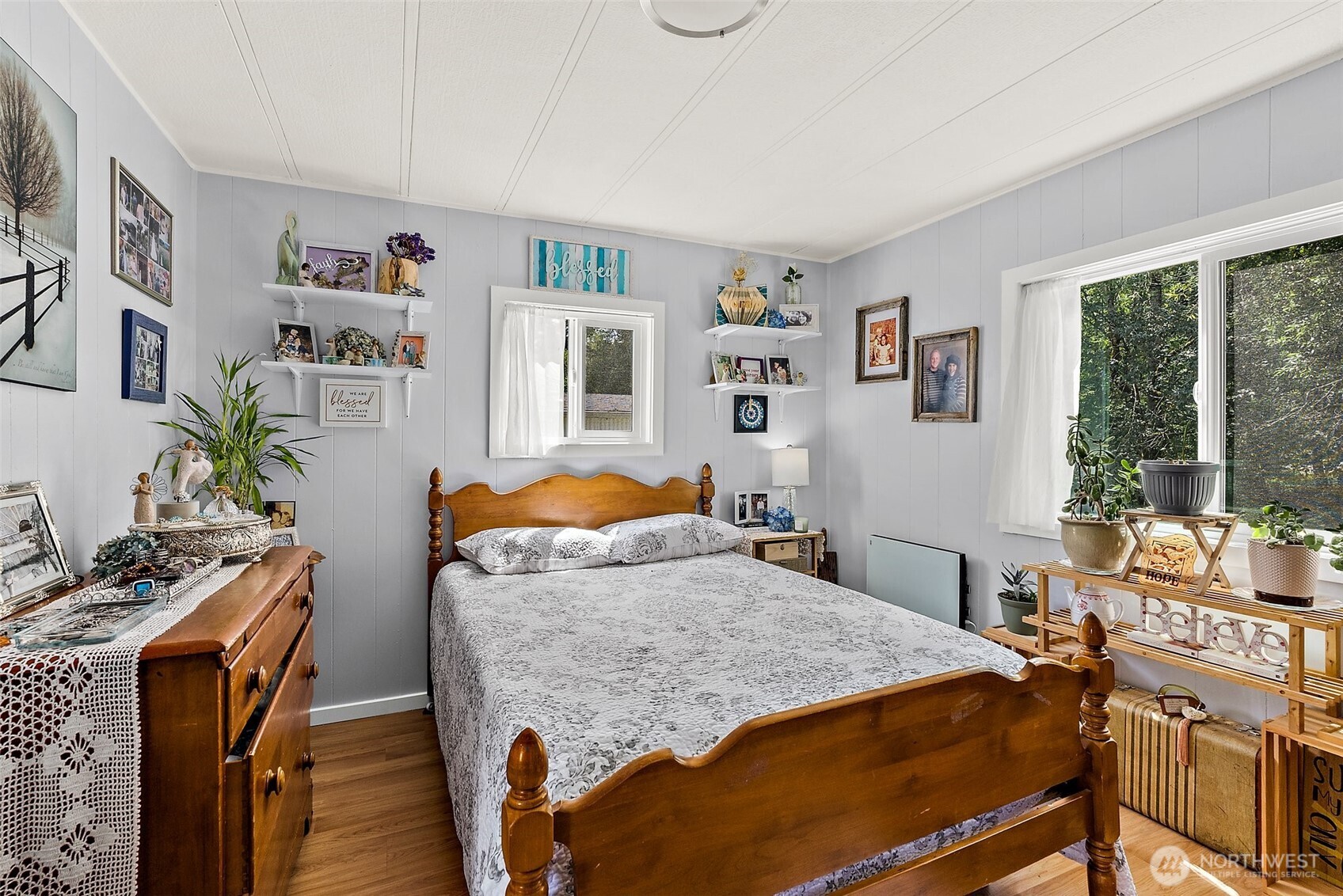 1050 Howard Street, Unit 9 Raymond, WA 98577 - Photo 11 of 20 a bedroom with furniture and a window