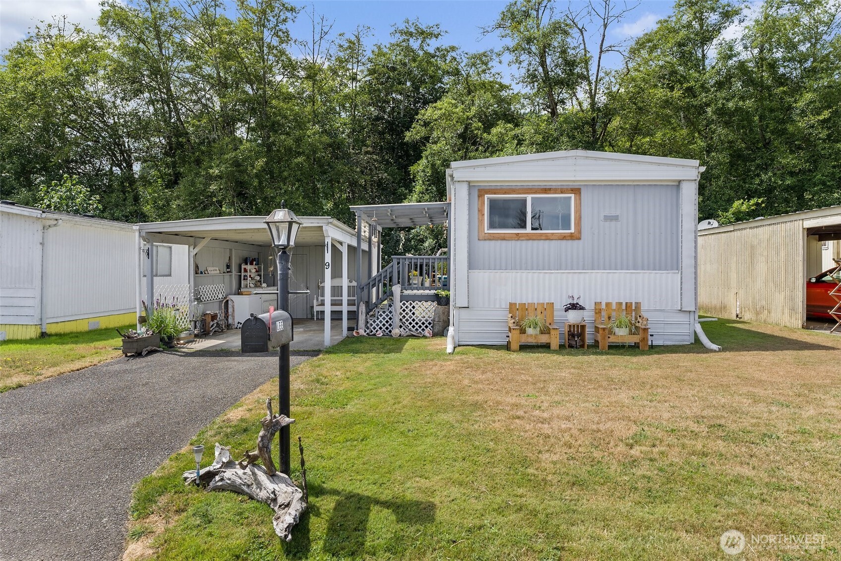 1050 Howard Street, Unit 9 Raymond, WA 98577 - Photo 4 of 20 a view of a house with backyard and sitting area