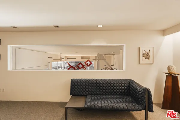 a bedroom with a bed and furniture