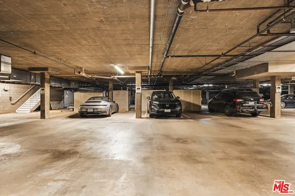 a car parked in parking lot of parking space