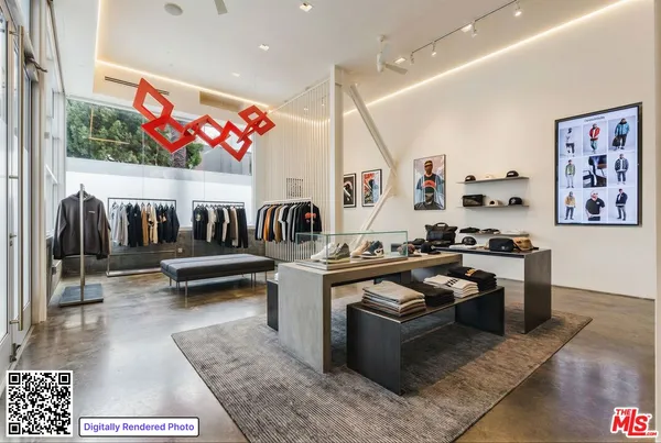a living room with furniture kitchen view and a rug