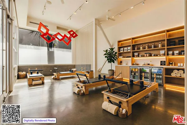 a living room with furniture pool table kitchen and living room view