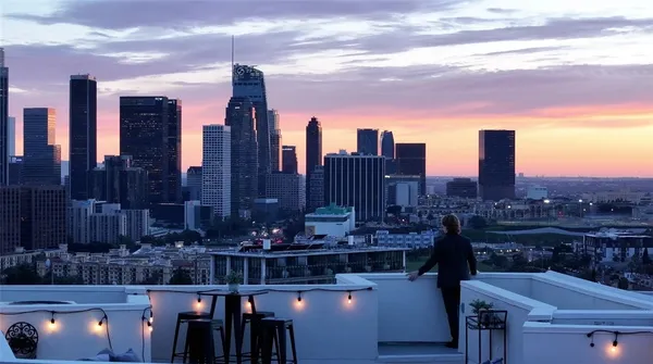 a view of a city with tall buildings