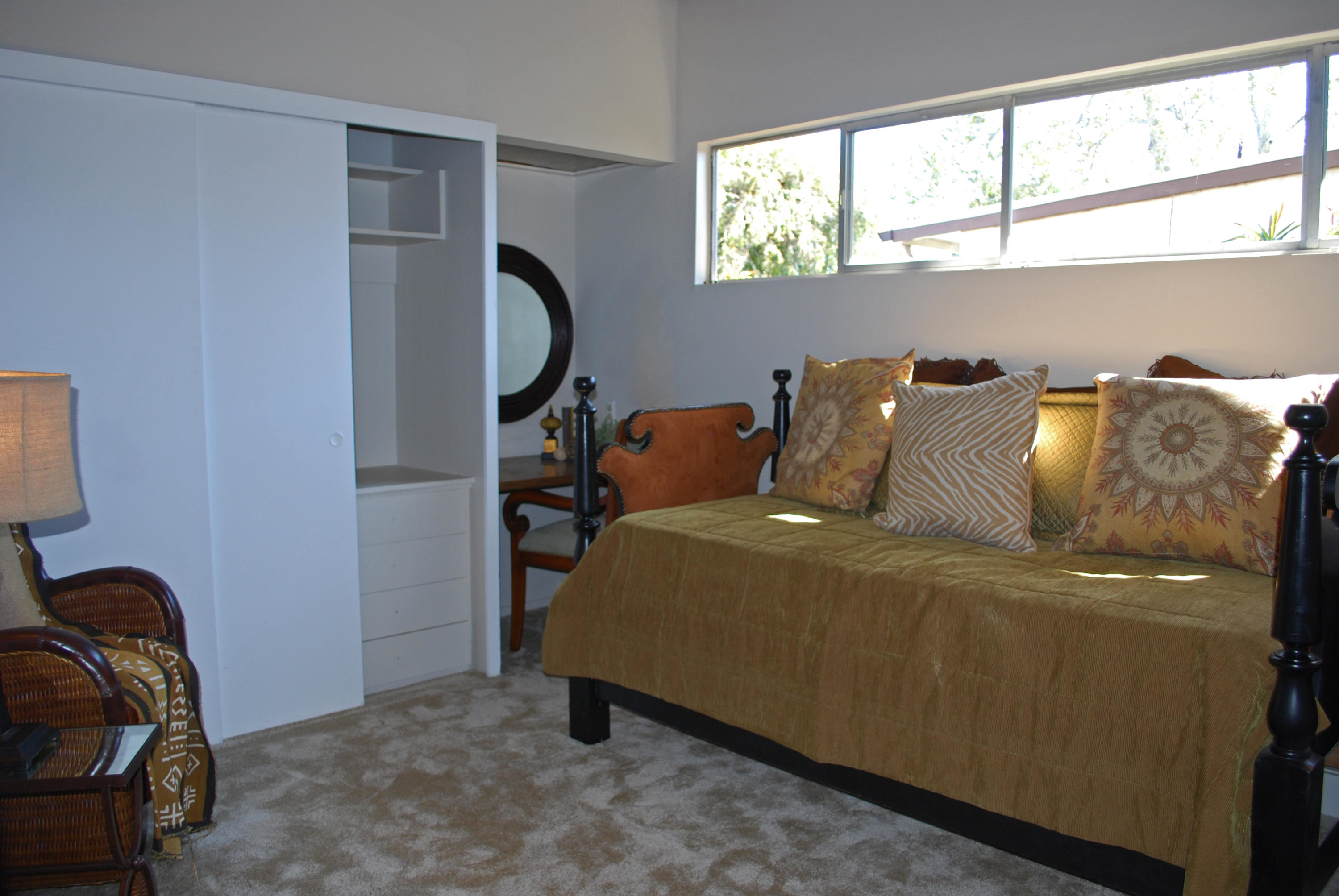 83 Cardinal Avenue Goleta, CA 93117 - Photo 12 of 17 a bed sitting in a bedroom next to a window