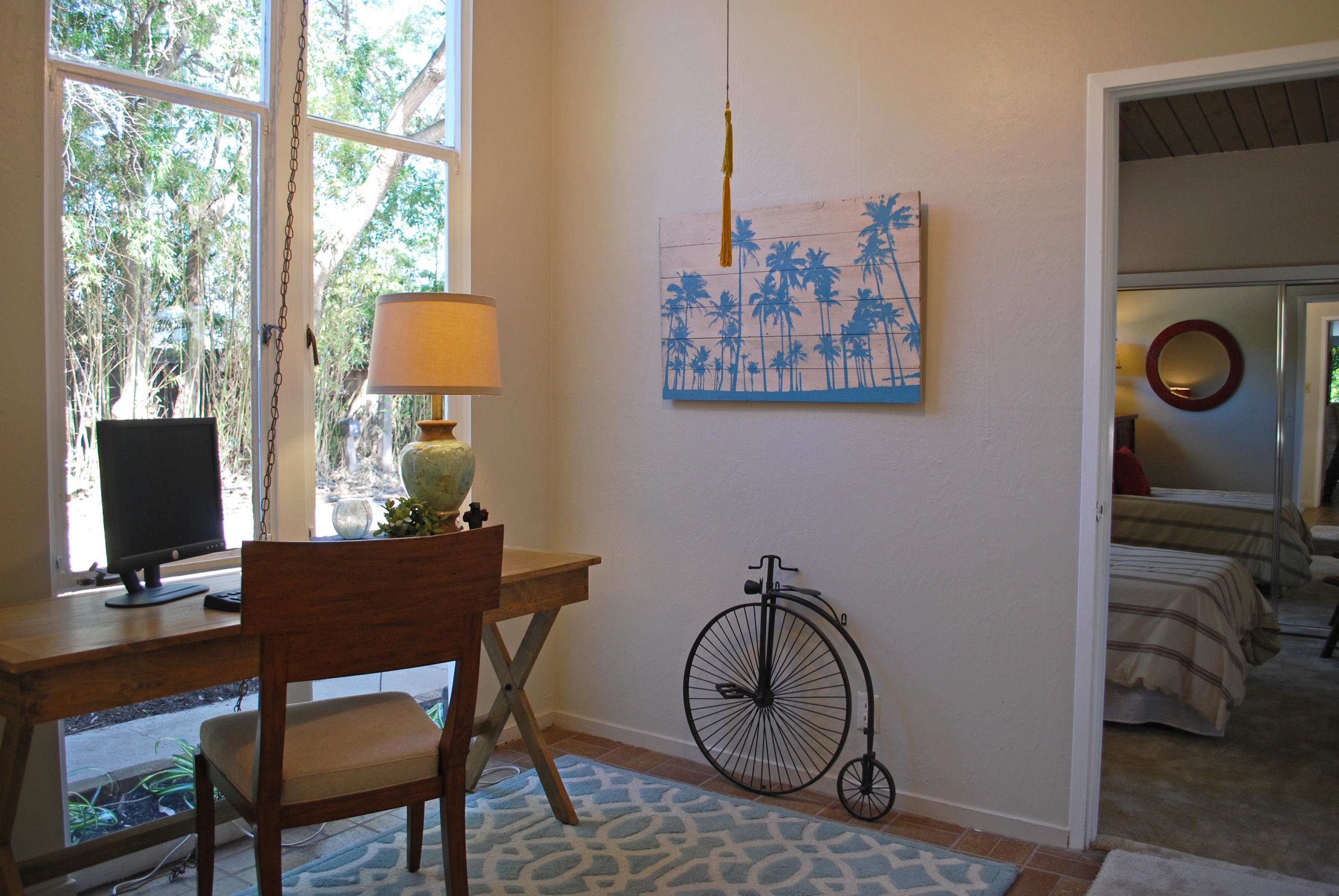 83 Cardinal Avenue Goleta, CA 93117 - Photo 13 of 17 a view of a workspace with furniture and a window