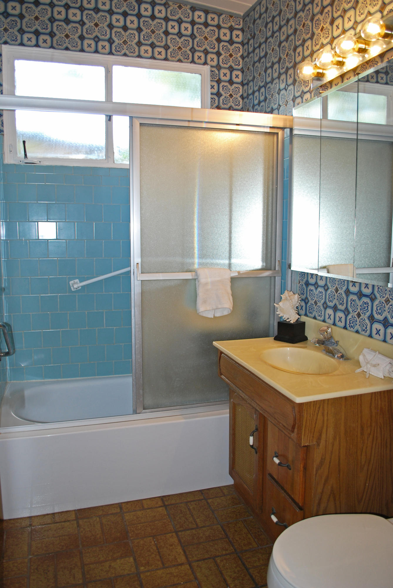 83 Cardinal Avenue Goleta, CA 93117 - Photo 14 of 17 a bathroom with a sink a toilet and shower