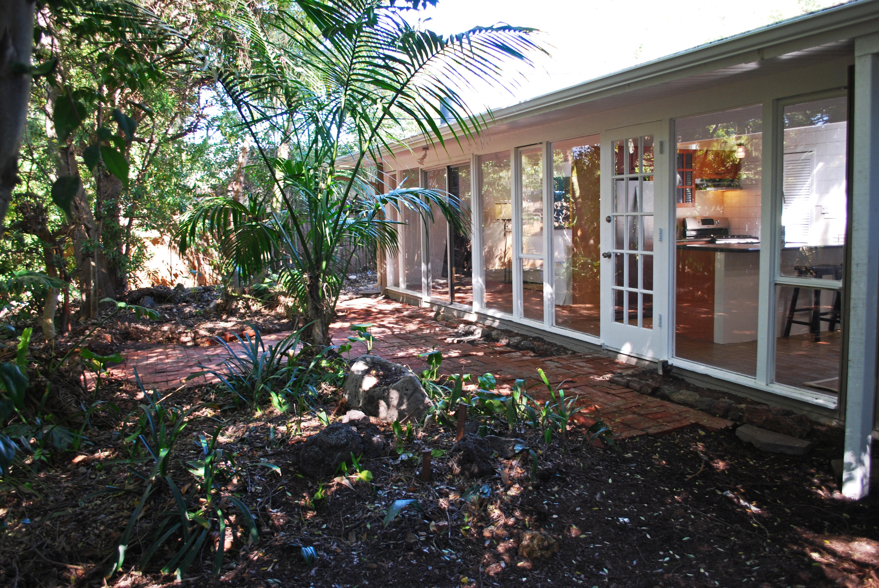83 Cardinal Avenue Goleta, CA 93117 - Photo 16 of 17 a view of a house with a tree