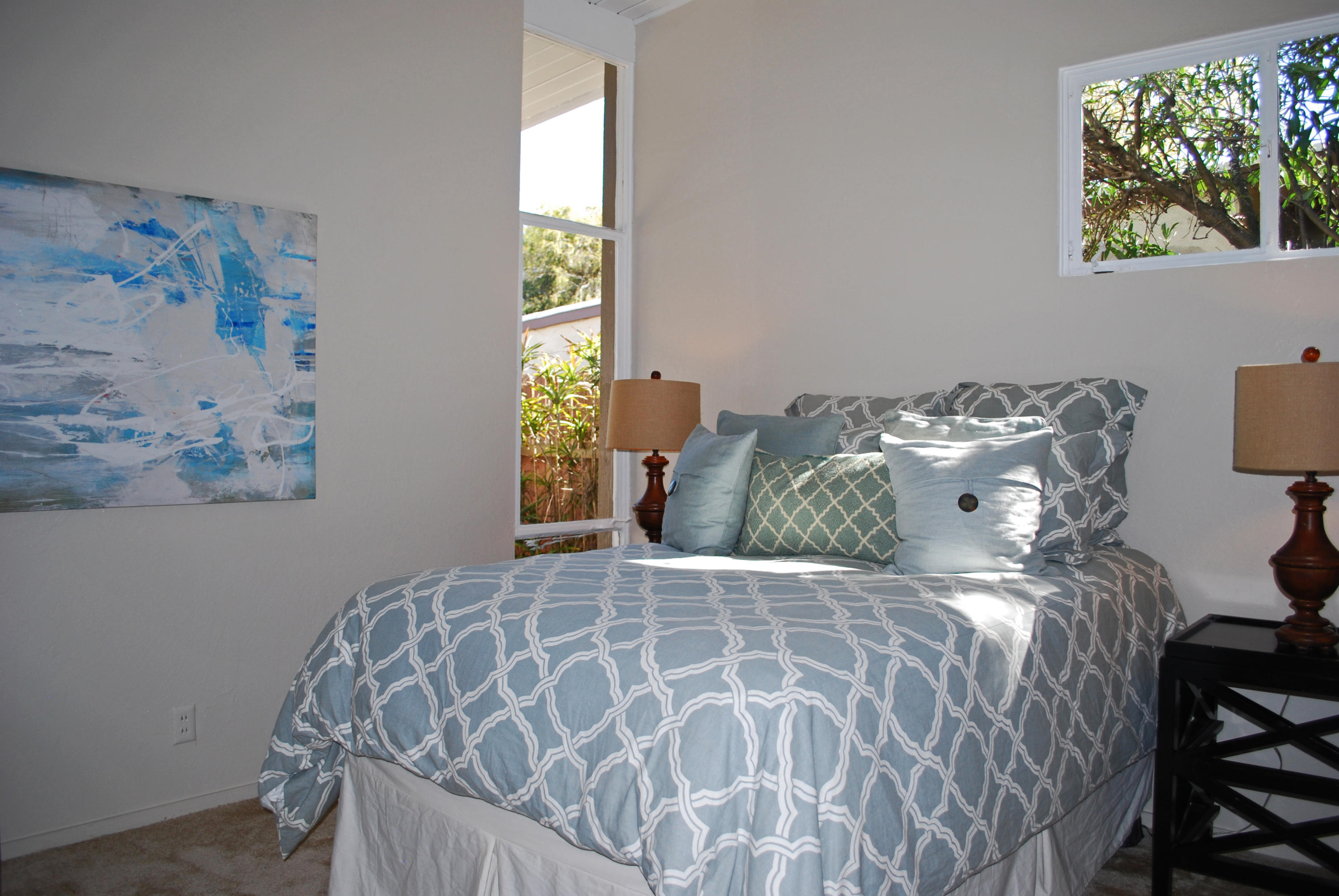 83 Cardinal Avenue Goleta, CA 93117 - Photo 10 of 17 a bed sitting in a bedroom next to a window