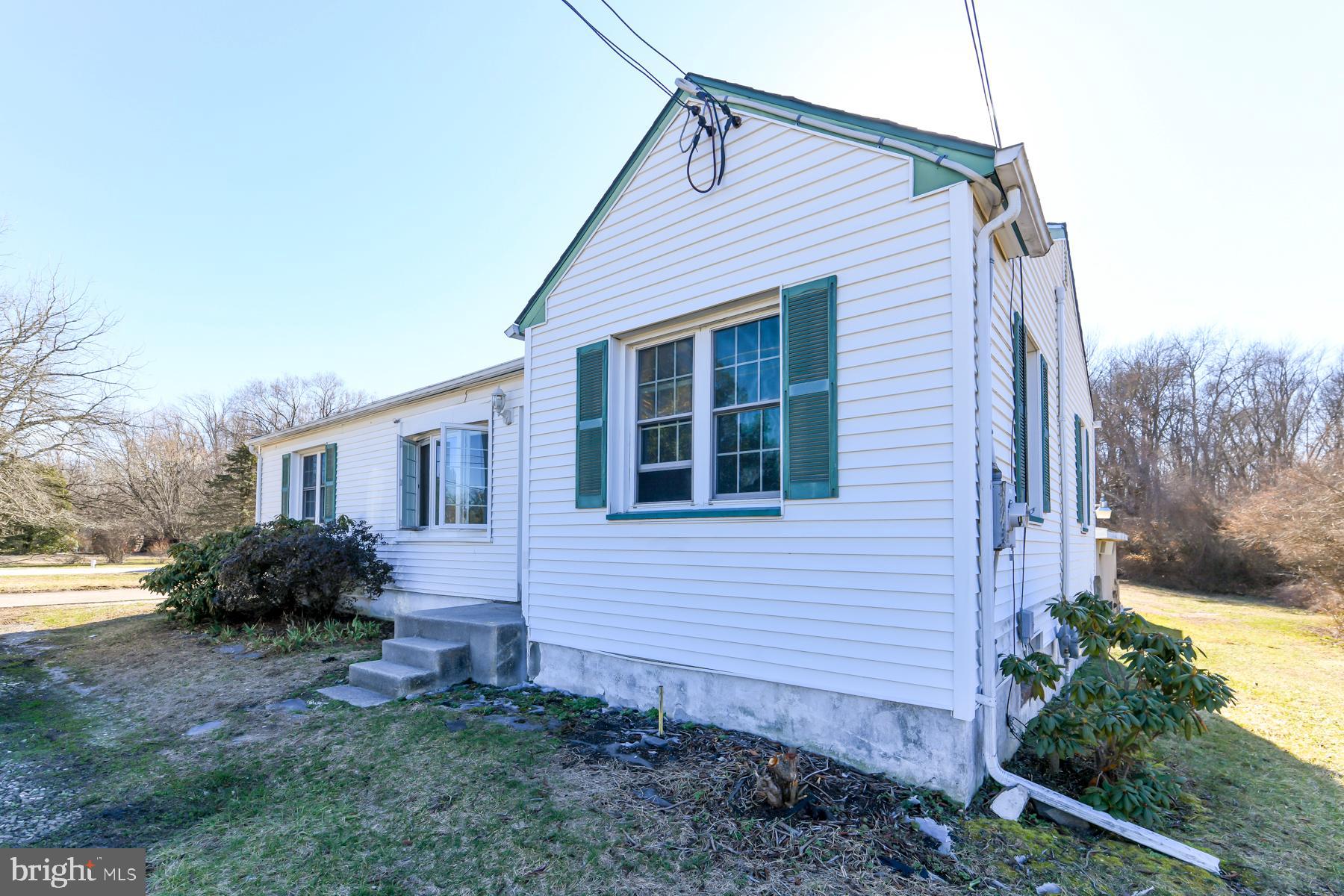 1261 North Tuckahoe Road Williamstown, NJ 08094 - Photo 2 of 7 a view of a house with a yard