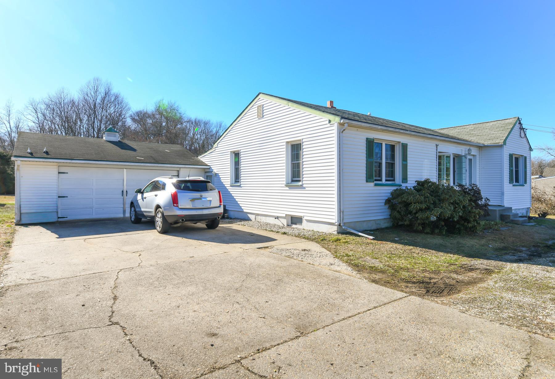 1261 North Tuckahoe Road Williamstown, NJ 08094 - Photo 3 of 7 a car parked in front of house