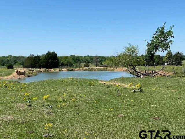 a view of a lake with outdoor space